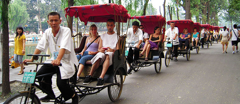 Experience a rickshaw tour through Hutongs