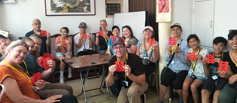 Experience Chinese paper cutting during Hutong visit