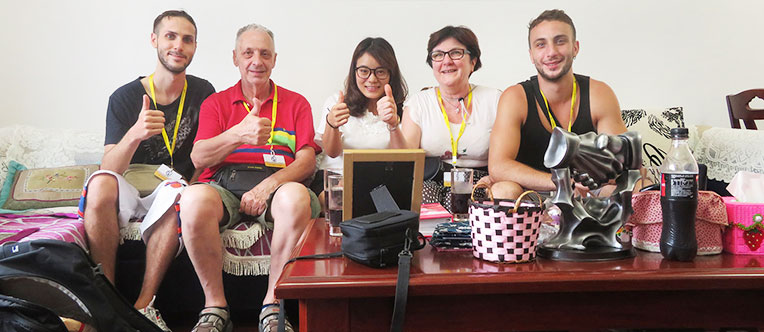 Our travel consultant Angela with her guests at a local home