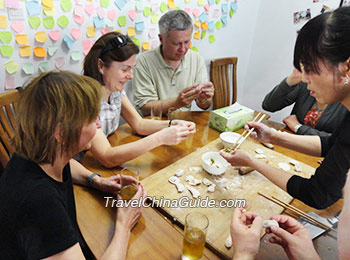 Making dumplings at a local family