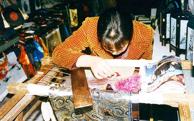 Diligent working on embroidery