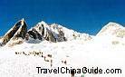 Tourists explore Jade Dragon Snow Mountain