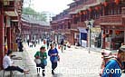 The locals strolling around the street usually wear their traditional garments, Duyun, Qiannan
