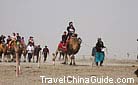Photo Credit: Mr. Lynn Hurst<br /><br />People in Kashgar are all good at riding and to them, riding on the sandy bank is quite a pleasure.