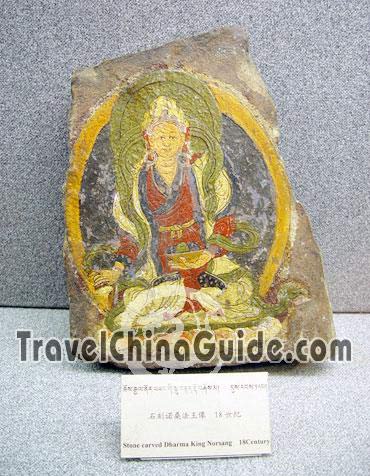 The image of Dharma King Norsang carved in stone is the relics of 18th Century.