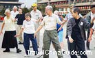 Foreigners performing Tai Chi Quan on a street in Xi'an.