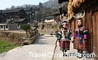 Two Miao girls in their peculiar national costumes, Qingman Miao Village