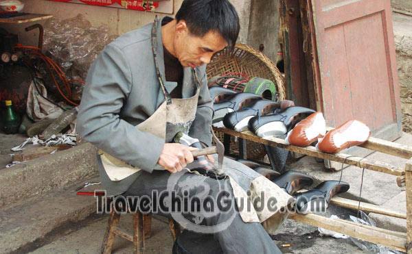 A leather shoe mender
