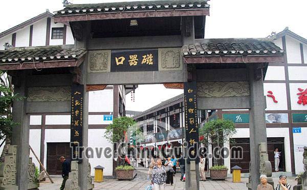 The gate built in the old chinese style and engraved with golden letters is the entrance to the porcelain village.