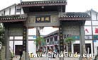 The gate built in the old chinese style and engraved with golden letters is the entrance to the porcelain village.