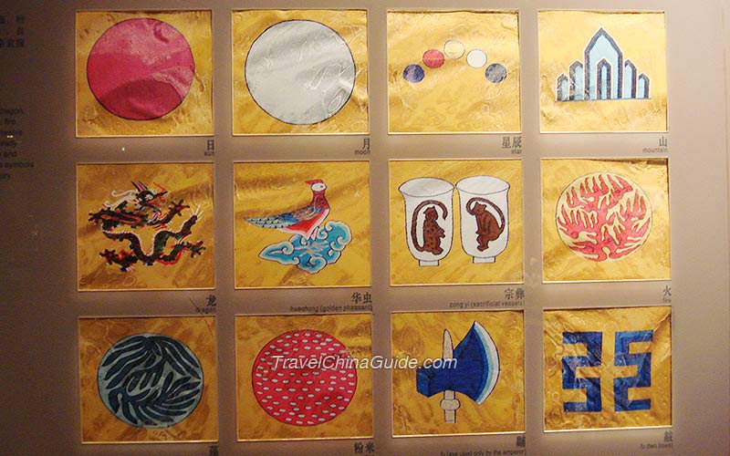 Twelve imperial symbols used only by the emperor: sun, moon and star are three sources of light; mountain symbolizes stability; golden pheasant suggests bright plumage; sacrificial vessels are for bravery and wisdom; algae means brilliance; fire means luminosity, rice means nourishment, axe and bows suggests resolution