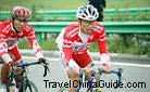 Two Chinese athletes on the International Road Cycling Race of Qinghai Lake, Qinghai