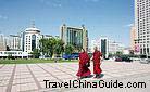 Two lamas take a walk in the Xining Square