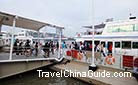 Visitors take the ferry to the Expo Park