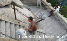 A Mt. Huashan carrier. He is carrying luggage onto the mountain top for his clients.