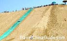 The beautiful sound made by the sand while you sliding down the slope is really akin to music.