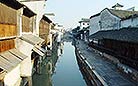 The noted water town of Wuzhen hides in a tranquil and unsophisticated town, 80 kilometers from Suzhou.
