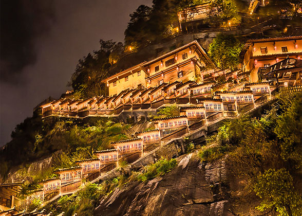 Cliffside Traditional Houses at Night