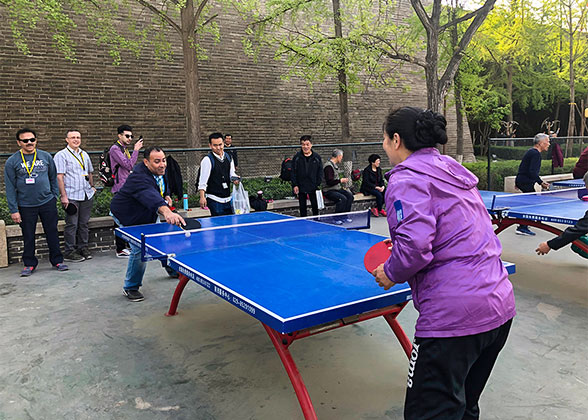 Our Guests Playing Pingpong with Locals