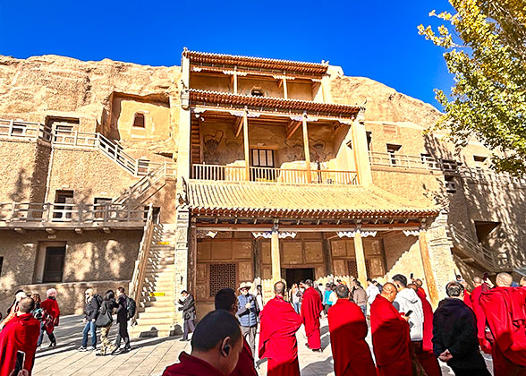 Tibetan Monks Visit Mogao Caves
