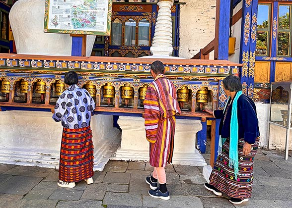 Local People Turning Prayer Wheels