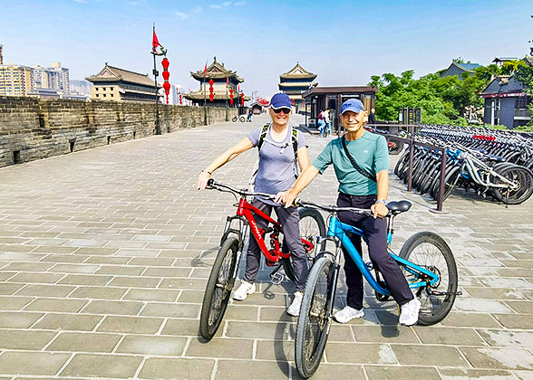 Our Clients Cycling on the City Wall