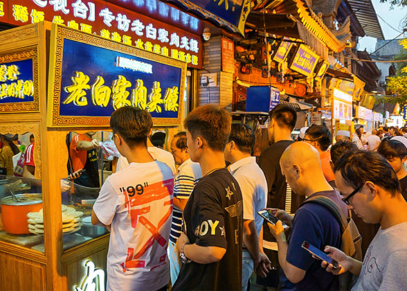 Tourists Queuing up for Roujiamo