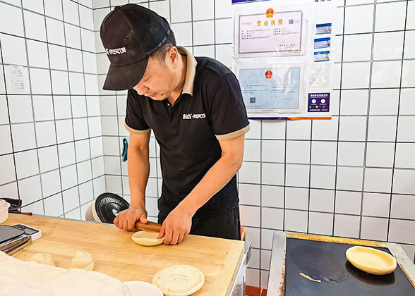 Rolling the Dough into Flat Rounds