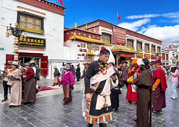Tibetans Pray along the Barkhor Street