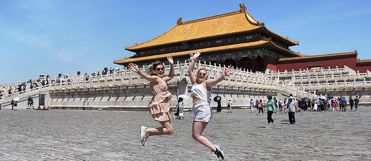 Take a photo with the majestic Forbidden City and for memory