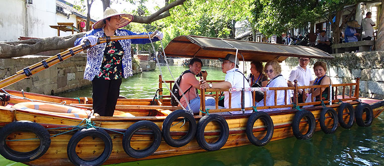 Experience a featured sculling boat trip along the canals