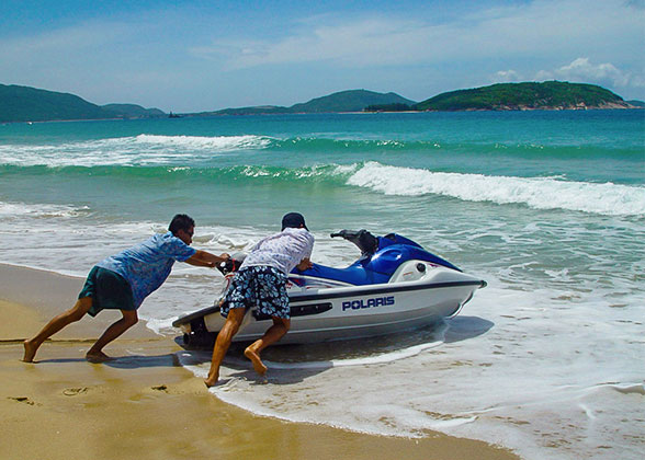 Tourists enjoying jet skiing