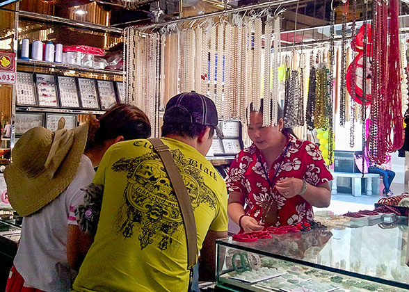 Tourists selecting goods