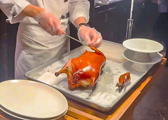 Slicing a Beijing Roast Duck