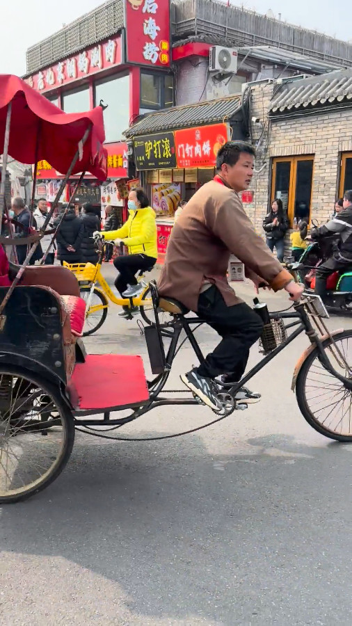 Taking a Rickshaw to Explore Beijing Hutongs