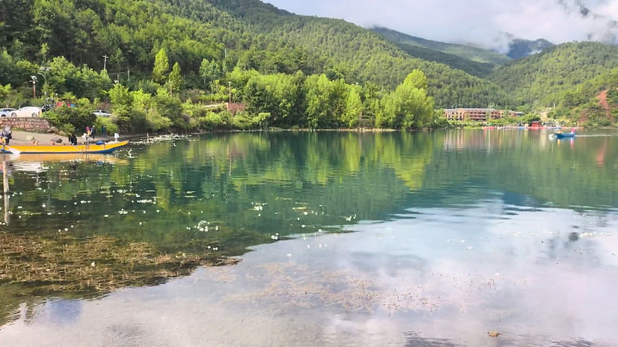 Lugu Lake and the Tourist Wooden Boat